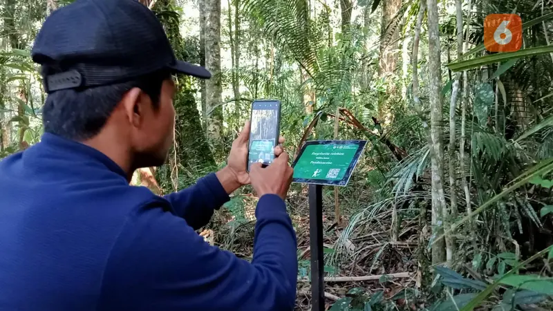 scan barcode untuk mengetahui informasi flora di lokasi Telaga Tambing, TNLL.