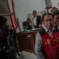 Terdakwa kasus dugaan penghilangan barang bukti pengaturan skor, Joko Driyono usai menjalani sidang putusan di PN Jakarta Selatan, Selasa (23/7/2019). Joko Driyono dinyatakan bersalah atas perkara pengrusakan barang bukti dengan vonis hukuman 1 tahun 6 bulan penjara. (Liputan6.com/Faizal Fanani)