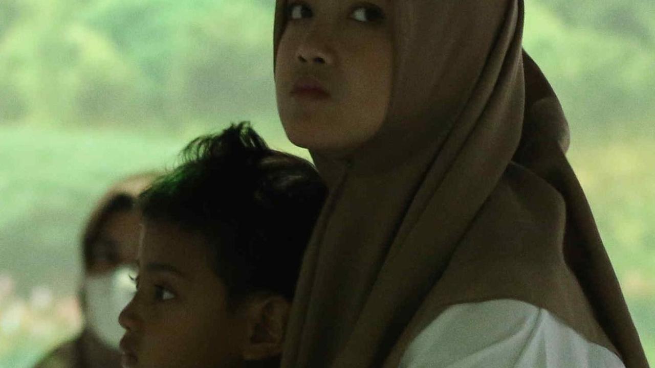 Ekspresi pengunjung saat&nbsp;menyaksikan berbagai warisan budaya yang ditampilkan dalam The Magical Korea-ASEAN Cultural Heritage Immersive Experience di Museum Nasional.