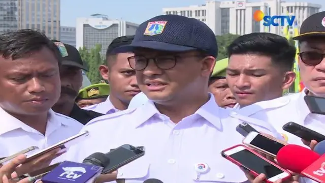 Anies Baswedan memimpin langsung apel siaga bencana banjir di Silang Monas pada Sabtu pagi, (18/11/2017).