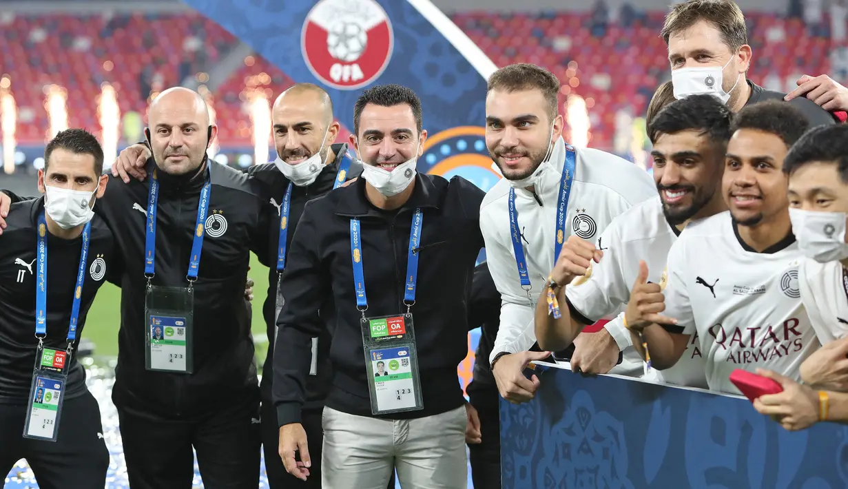 Belum genap dua tahun melatih Al Sadd, musim ini Xavi mempersembahkan gelar Liga Qatar untuk Al Sadd. (AFP/Karim Jaafar)