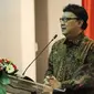 Menteri Dalam Negeri Tjahjo Kumolo memberikan sambutan saat menghadiri acara peresmian 'Pemilihan Kepala Daerah Serentak' di Kantor KPU, Jakarta, Jumat (17/4/2015). (Liputan6.com/Faizal Fanani)