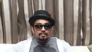 Musisi Glenn Fredly enggan berkomentar mengenai kandasnya hubungannya dengan penyanyi seksi Aura Kasih. (Andy Masela/Bintang.com)