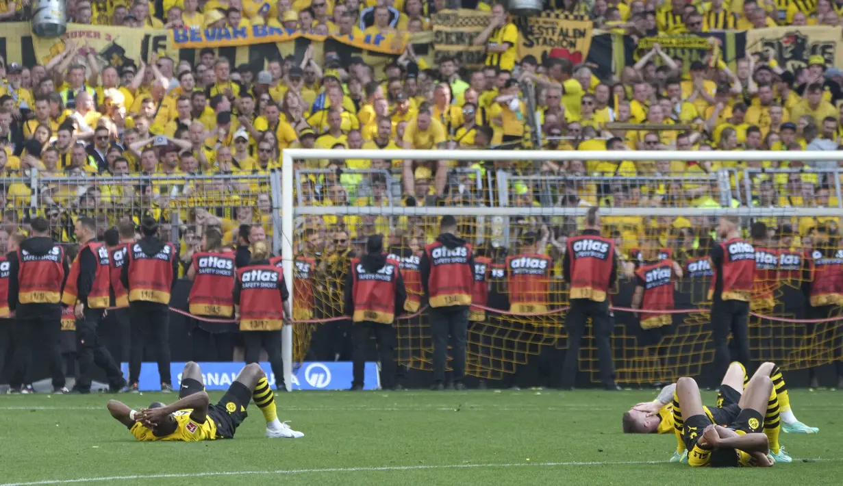 Duel Dortmund vs Mainz berakhir dengan skor 2-2.  (AP Photo/Michael Probst)