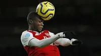 Nicolas Pepe. Ia menjadi pemain termahal Arsenal hingga saat ini setelah dibeli dari Lille seharga 80 juta euro di awal musim 2019/2020, mematahkan rekor sebelumnya yang dibuat Pierre-Emerick Aubameyang. Total hingga akhir musim ini telah bermain dalam 89 laga dan mencetak 24 gol. (AFP/Ian Kington)