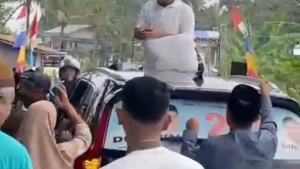 pria sawer duit di banten