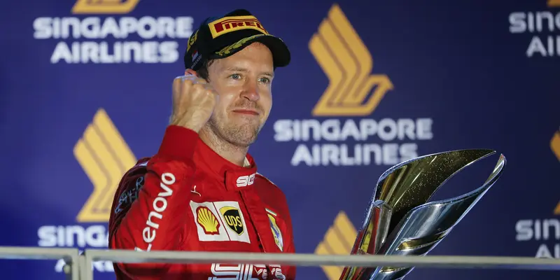 Sebastian Vettel Juarai Formula 1 Grand Prix Singapura