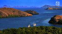 Pemandangan sebuah teluk di Pulau Rinca, Taman Nasional Komodo, NTT, Minggu (14/10). Selain terkenal dengan komodonya, Pulau Rinca memiliki pemandangan alam yang indah dan memikat wisatawan. (Merdeka.com/Arie basuki)