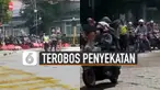 Beredar video rombongan pengendara motor nekat menjebol dan menerobos penyekatan jalur di ruas simpang Jalan Aceh - Merdeka, Bandung.