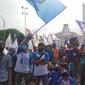 Aksi demo buruh menolak UU Cipta Kerja di Surabaya, Jawa Timur pada Selasa, (27/10/2020) (Foto: Liputan6.com/Dian Kurniawan)