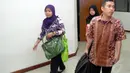 Hendra Saputra saat memasuki ruang persidangan di Pengadilan Tindak Pidana Korupsi  (Tipikor) , Jakarta (23/7/14) (Liputan6.com/Miftahul Hayat)