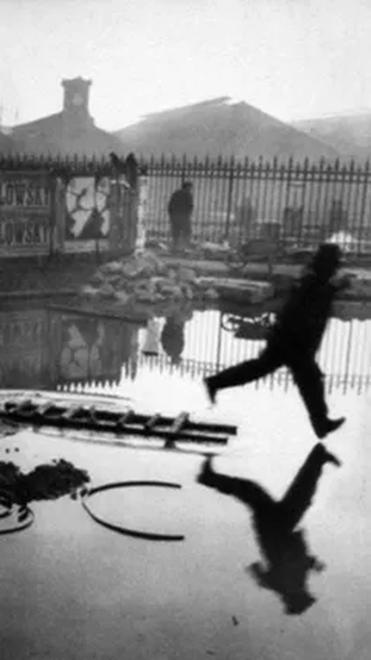 Man Jumping the Puddle – 
Henri Cartier-Bresson, 1932