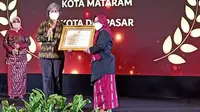 Pemkot Denpasar menyabet dua penghargaan dari KPAI. (Istimewa).
