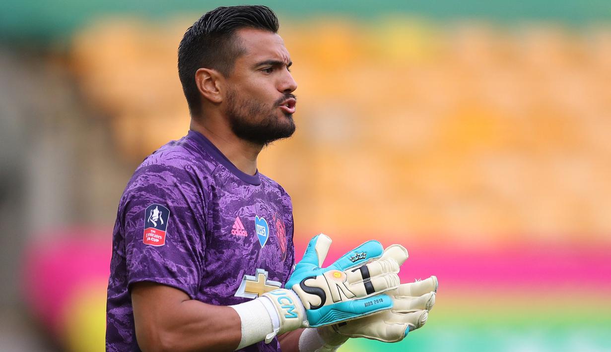 Sergio Romero. Kiper asal Argentina ini didatangkan Manchester United dari Sampdoria pada 2014/2015. Hingga musim 2020/2021 ia tampil 61 kali dengan catatan 39 kali clean sheet. Ia digeser oleh Dean Henderson sebagai kiper kedua, lalu memutuskan bergabung dengan Venezia. (AFP/Pool/Catherine Ivill)