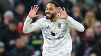 Striker Man Utd, Matheus Cunha, merayakan golnya ke gawang Aston Villa, Minggu (21/12/2025) (Jacob King/PA via AP)
