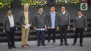 Ketiga Calon Presiden dan Calon Wakil Presiden pada Pemilu 2024 berfoto bersama sesaat sebelum mengakhiri kegiatan Paku Integritas di Gedung Merah Putih Komisi Pemberantasan Korupsi (KPK), Jakarta, Rabu (17/1/2024). (Liputan6.com/Angga Yuniar)
