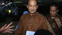 Kamis (13/03/14), Mantan Deputi Gubernur BI Bidang 4, Budi Mulya kembali menjalani sidang di Pengadilan Tipikor, Jakarta (Liputan6.com/Herman Zakharia)