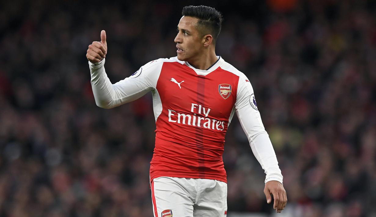 5. Alexis Sanchez - Alexis Sanchez memiliki banyak pengaruh untuk The Gunners dalam beberapa musim terakhir. Mantan pemain Barcelona  itu tampil menggila. Hanya dalam tiga musim, Alexis sudah cetak 72 gol dalam 144 laga. (EPA/Will Oliver)