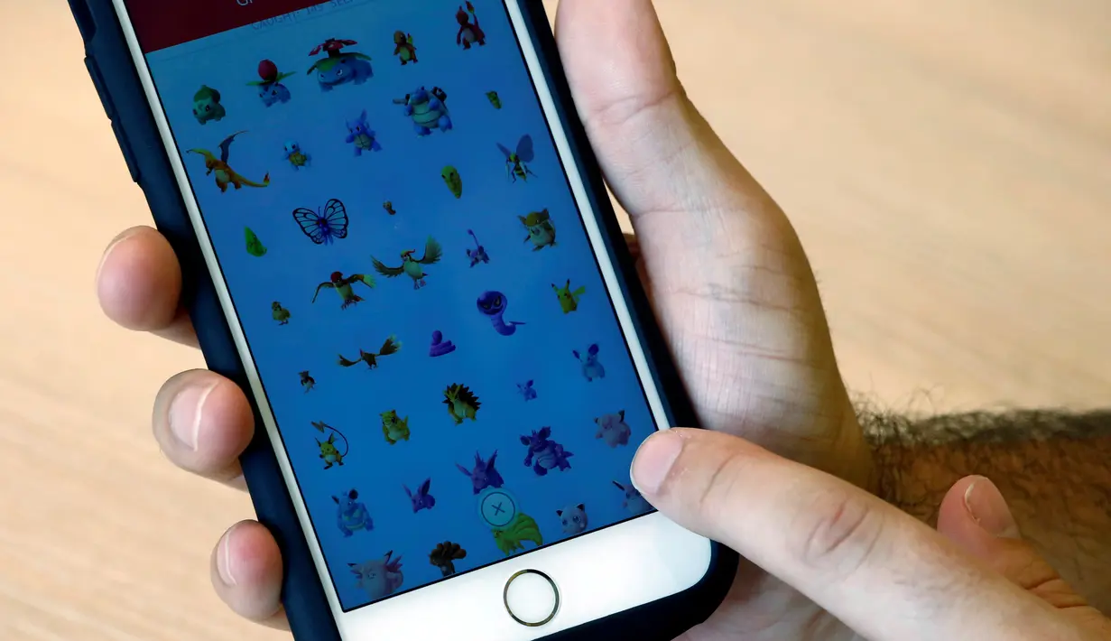 Nick Johnson saat di jumpai awak media di Tokyo, Jepang, Senin (8/8). Dalam video game asli yang mendasari permainan Pokemon Go, terdapat 151 monster yang bisa ditangkap. (REUTERS/Kim Kyung-Hoon)