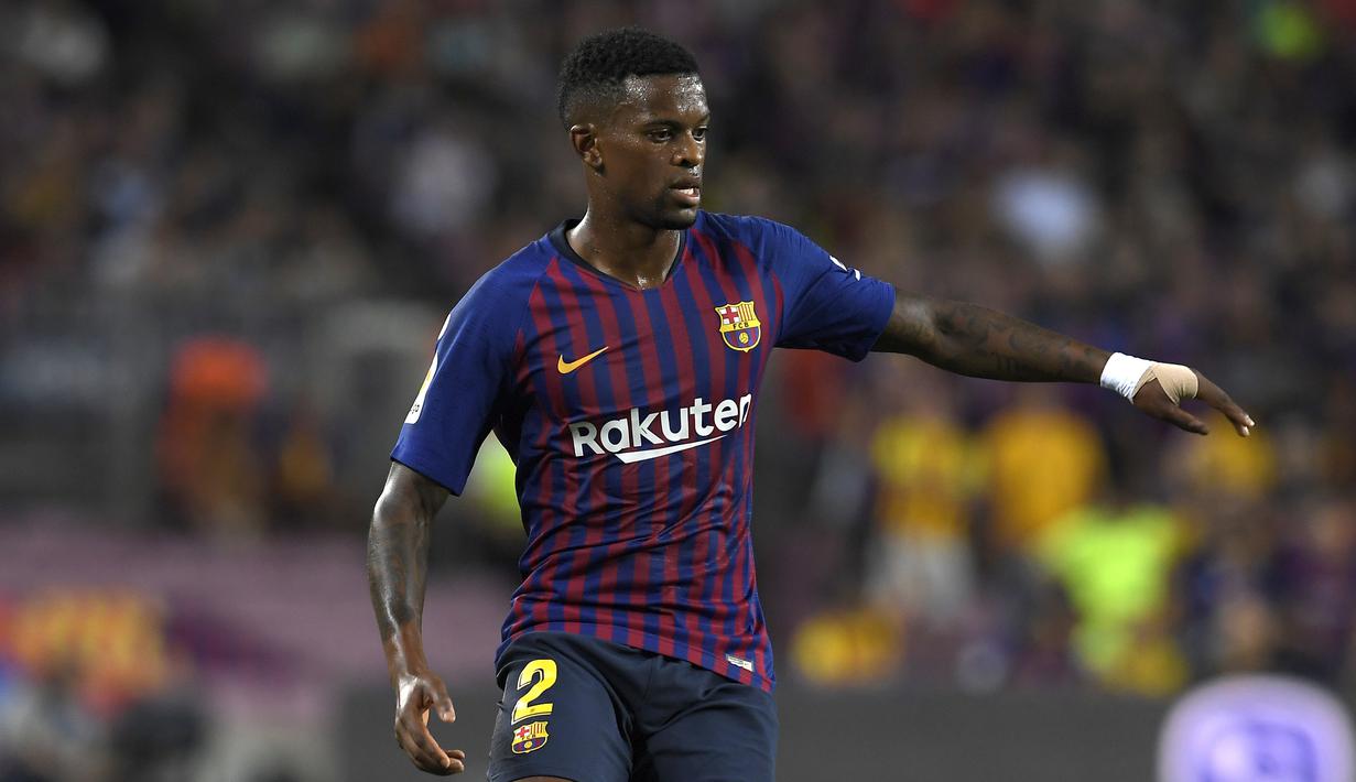 5. Nelson Semedo - Performa Nelson Semedo tidak terlalu istimewa sebagai bek kanan karena area yang dijaga sering menjadi menjadi titik lemah Barcelona. Laga melawan Bayern Munchen menjadi momen ketika Nelson Semedo tidak mampu berbuat banyak di pertahanan. (AFP/Lluis Gene)
