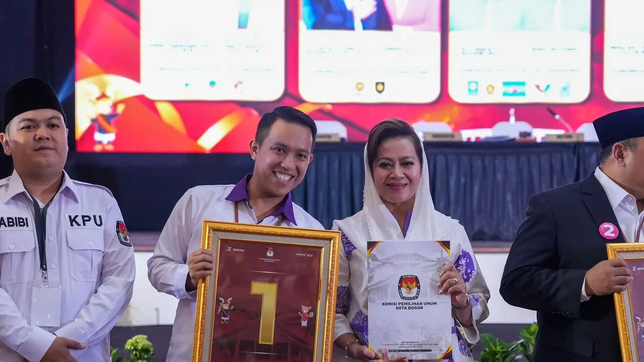 Pasangan calon Wali Kota dan Wakil Wali Kota Bogor nomor urut 1, Sendi Fardiansyah dan Melli Darsa saat pengambilan nomor urut. (Istimewa)