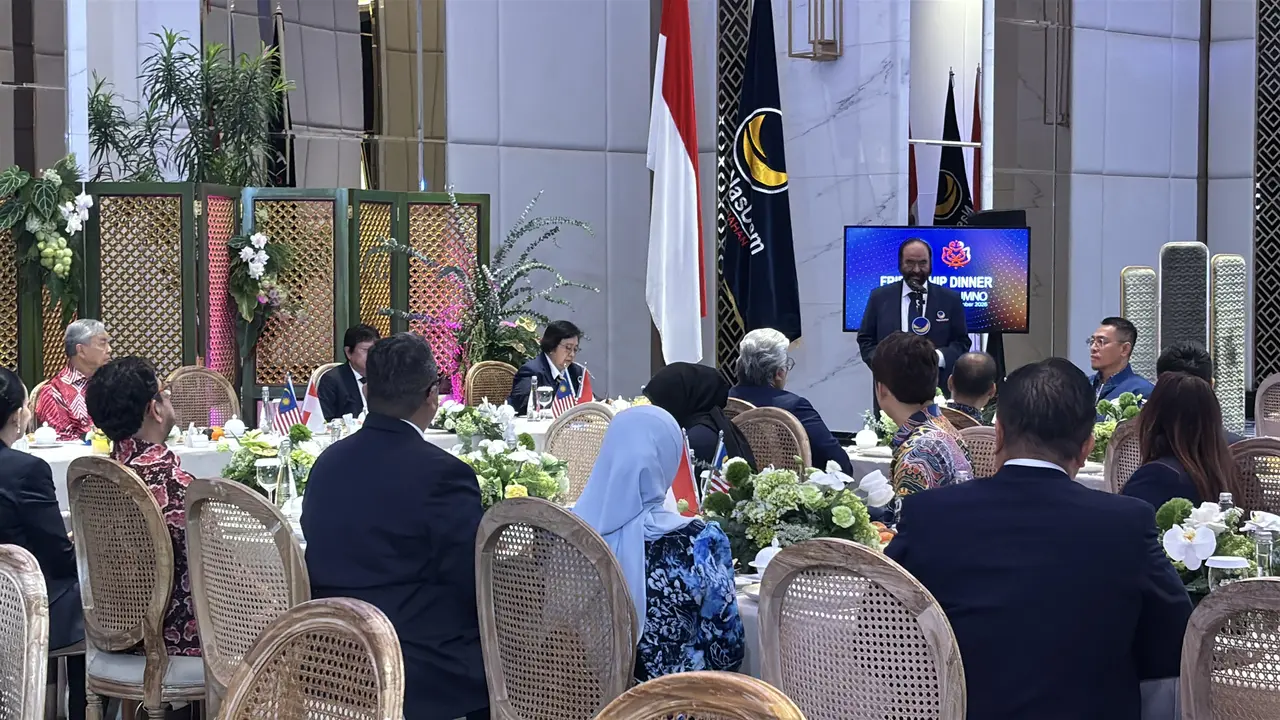 Surya Paloh dan Wakil Perdana Menteri Malaysia sekaligus Presiden UMNO Ahmad Zahid Hamidi
