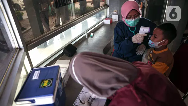 FOTO: Kejar Target Vaksinasi Anak Usia 6-11 Tahun