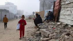 Pihak mediator Mesir dan Qatar, dengan dukungan Amerika Serikat mengumumkan kesepakatan gencatan senjata dan pembebasan sandera antara Israel dan Hamas direncanakan akan dimulai pada 19 Januari 2025. (Bashar TALEB/AFP)