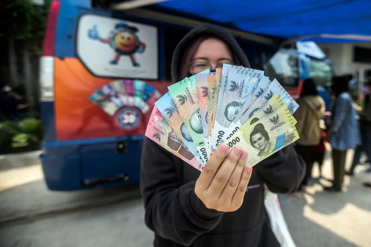 Antusiasme Warga Menukarkan Uang Rupiah Kertas Baru