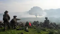 Pasukan cadangan tempur dan tank Israel mengambil bagian dalam latihan di front Lebanon di Dataran Tinggi Golan yang dikuasai Israel, Kamis (4/1/2024). (AP Photo/Ohad Zwigenberg)