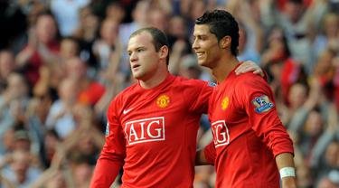 Wayne Rooney dan Cristiano Ronaldo (AFP PHOTO/ANDREW YATES)