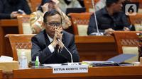 Menko Polhukam Mahfud MD mengikuti rapat kerja bersama Komisi III DPR di Kompleks Parlemen, Senayan, Jakarta, Rabu (29/3/2023). Rapat tersebut membahas soal transaksi mencurigakan Rp 349 triliun di Kementerian Keuangan (Kemenkeu). (Liputan6.com/Faizal Fanani)