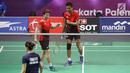 Ganda campuran Indonesia, Tontowi Ahmad/Liliyana Natsir saat melawan Lee Chun Hei R/Chau Hoi Wah (Hong Kong) di perempat final Bulutangkis Asian Games 2018 di Istora Kompleks GBK, Jakarta, Sabtu (25/8). (Liputan6.com/Helmi Fithriansyah)