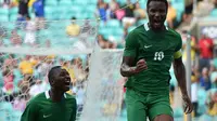 Reaksi Kapten Nigeria, John Obi Mikel (kanan), usai mencetak gol ke gawang Denmark, pada babak perempat final cabang sepak bola Olimpiade Rio 2016, di Arena Fonte Nova, Salvador, Brasil, Minggu (14/8/2016) dini hari WIB. Nigeria unggul 2-0, dan melaju ke 