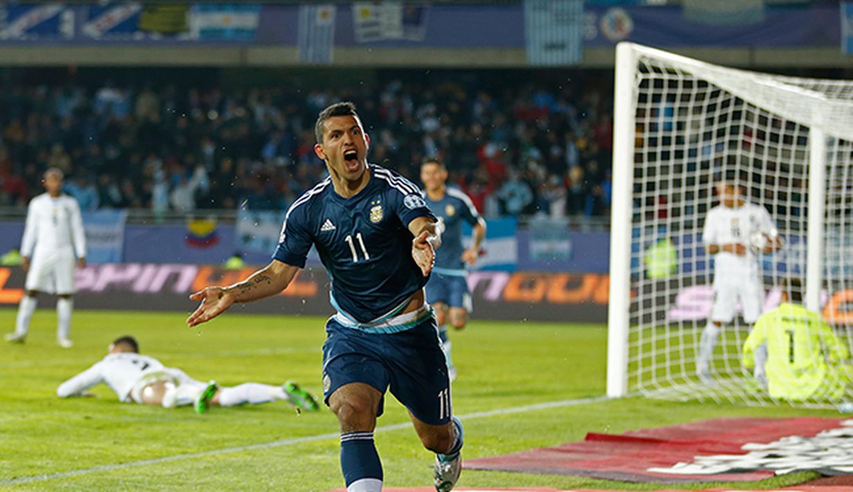 Ekspresi Sergio Aguero saat merayakan gol yang dicetak ke gawang Uruguay. (AP Photo/Andre Penner)