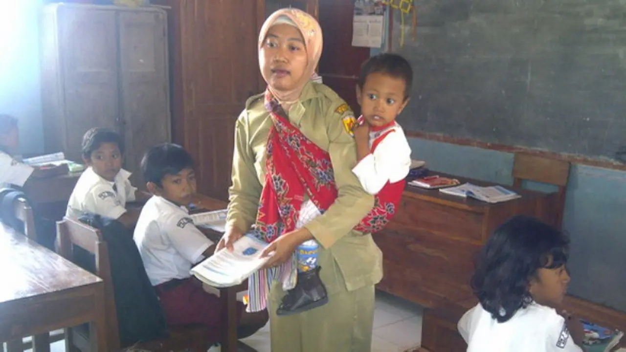 Guru Hasniah. Sumber: infopgri