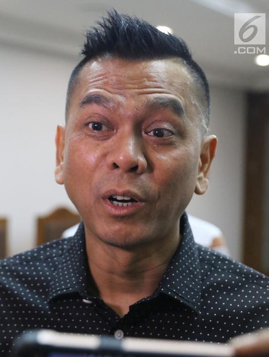 Mantan anggota DPRD DKI Jakarta, Mohamad Sanusi usai menjalani sidang lanjutan Peninjauan Kembali (PK) di PN Jakarta Pusat, Rabu (25/7/2018). Pada persidangan ini kuasa hukum pemohon membacakan kesimpulan pengajuan PK. (Liputan6.com/Helmi Fithriansyah)