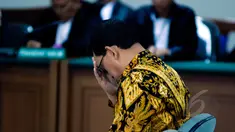 Terdakwa mantan Wakil Kepala Korlantas Mabes Polri, Brigjen (Pol) Didik Purnomo menjalani sidang pembacaan vonis di Pengadilan Tipikor, Jakarta, Rabu (22/4/2015). Didik divonis lima tahun penjara terkait kasus simulator SIM. (Liputan6.com/Yoppy Renato)
