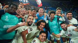 Pemain Lille merayakan kemenangan atas AS Roma pada matchday kedua Liga Europa di Stadion Olimpico, Roma, Kamis (2/10/2025) malam WIB. (AP Photo/Andrew Medichini)