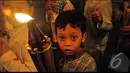 Pawai obor ini menjadi hiburan tersendiri dan menjadi tradisi yang ditunggu-tunggu oleh para bocah di di Matraman, Jakarta (Liputan6.com/Faizal Fanani)