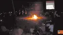 Citizen6, Ambon: Para Jemaat Hok Im Tong, melaksanakan Perayaan Ibadah Paskah di Pantai Natsepa, Ambon, Maluku, Minggu (24/4). (Pengirim: Gagartang)