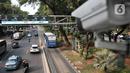 Kendaraan melintasi gerbang Electronic Road Pricing (ERP) di Jalan Medan Merdeka Barat, Jakarta, Rabu (20/11/2019). DKI Jakarta akan mengimplementasikan konsep ERP mulai tahun 2020. (merdeka.com/Iqbal Nugroho)