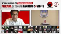 Gubernur Jatim Khofifah Indar Parawansa saat jadi pembicara bersama Ketua Umum Taruna Merah Putih (TMP) Maruarar Sirait dalam webinar Pilkada di Tengah Pandemi Covid-19 yang digelar secara daring, Minggu (9/8/2020) malam. (Ist)