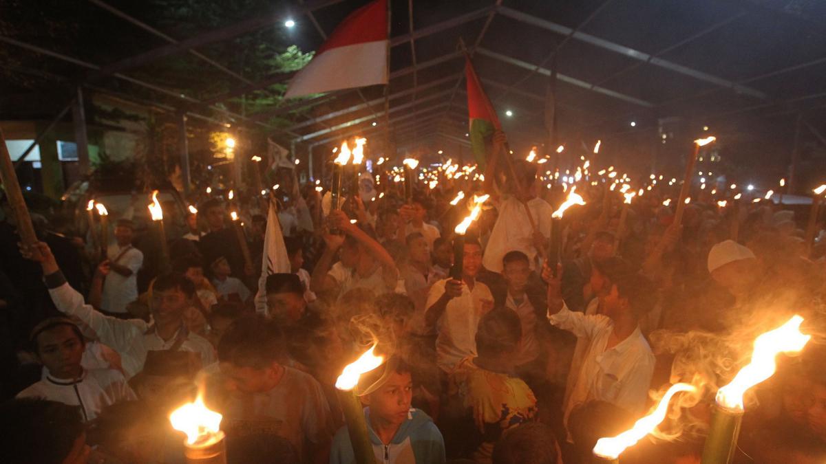 Rayakan Lebaran di Manado, Ini Tradisi Tumbilotohe dan Iwad yang Ikonik