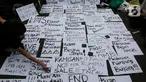 Aktivis dan pegiat Hak Asasi Manusia (HAM) mengikuti aksi 17 Tahun Aksi Kamisan di depan Istana Negara, Jakarta, Kamis (18/1/2024). (Liputan6.com/Herman Zakharia)