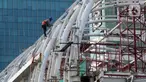 Pekerja menyelesaikan pengecatan rangka salah satu Stasiun LRT di Jalan HR Rasuna Said, Jakarta, Kamis (25/6/2020). Pada tahun 2020, Kementerian Pekerjaan Umum dan Perumahan Rakyat (PUPR) menargetkan sertifikasi kepada 113.900 orang tenaga kerja konstruksi. (Liputan6.com/Helmi Fithriansyah)