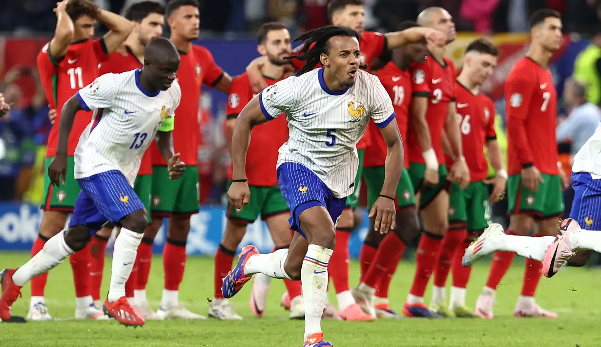 Prancis menjadi pemenang setelah mengungguli Portugal di babak adu penalti (5-3). (FRANCK FIFE/AFP)