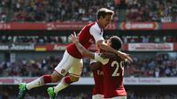 Nacho Monreal cetak gol pertama saat Arsenal cukur West Ham United ( IAN KINGTON / AFP)