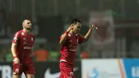 Pemain Persija Jakarta, Novri Setiawan usai mencetak gol ke gawang Persipura Jayapura pada lanjutan Liga 1 Gojek bersama Bukalapak di Stadion Pakansari, Bogor, (25/5/2018).  Persija menang 2-0. (Bola.com/Nick Hanoatubun)