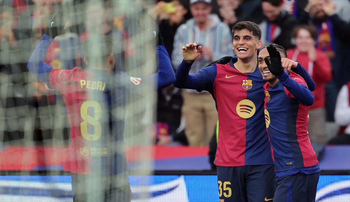 Gol kemenangan Barcelona atas Real Sociedad dibuka pada menit ke-25 lewat aksi Gerard Martin. (LLUIS GENE/AFP)